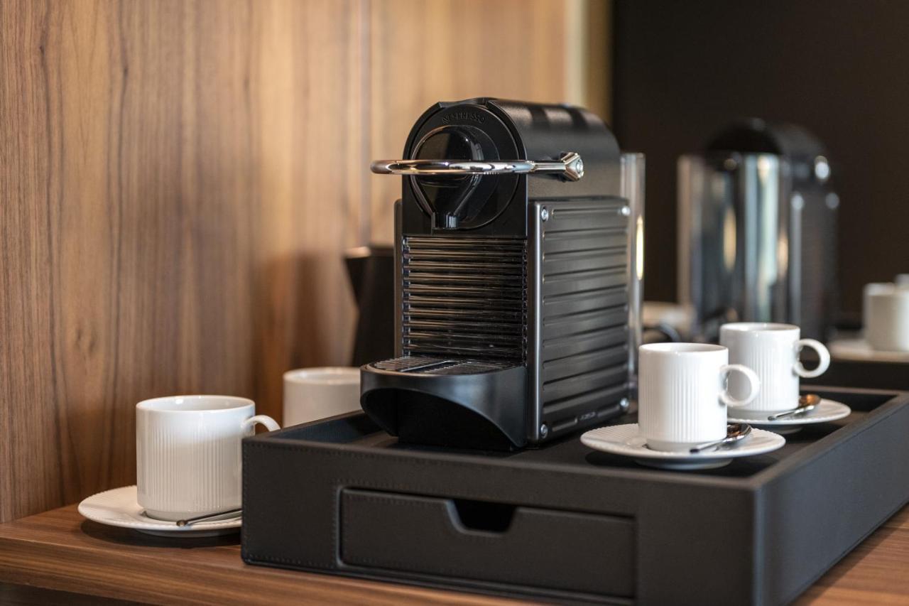 Renaissance Porto Lapa Hotel Екстериор снимка A Nespresso coffee machine